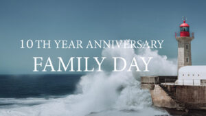 Lighthouse with waves and anniversary text.