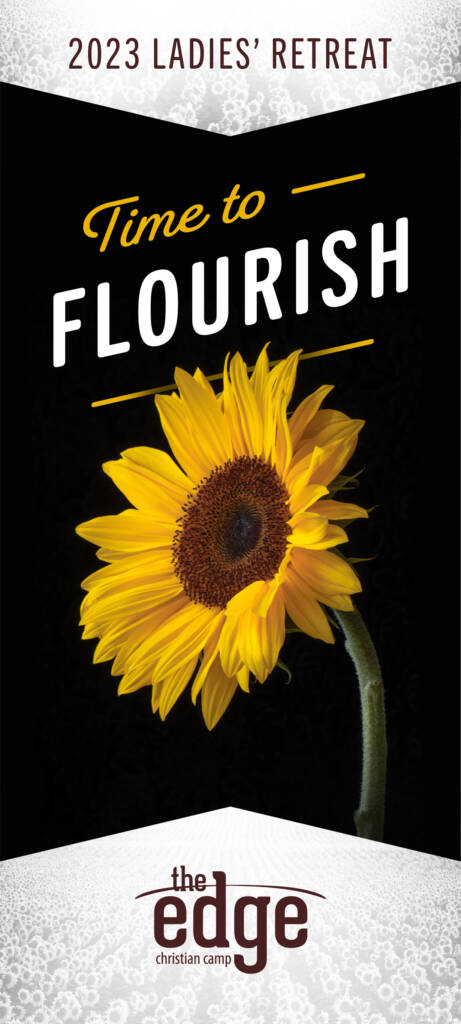 A yellow sunflower with the word flourish written underneath it.